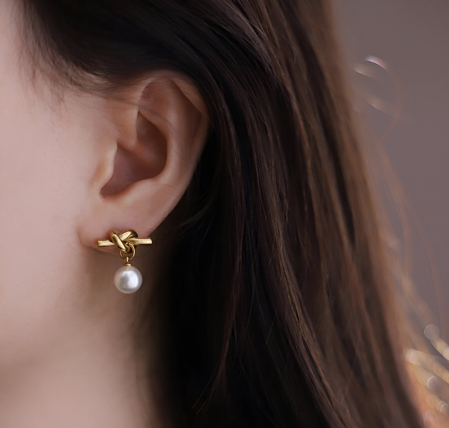 Aretes Lazo de Oro - Acero Inoxidable bañado en Oro de 18K